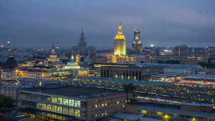 Fototapeta premium Evening top view of three railway stations day to night timelapse at the Komsomolskaya square in Moscow, Russia