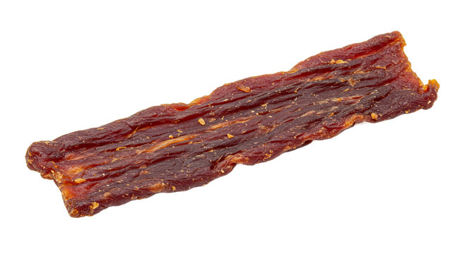 Dark Brown Beef Jerky Strip on Blurred Background