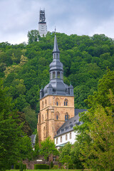 Church and Abbey of St. Mauritius with Schaumberg tower at Tholey in the district of Sankt Wendel, in Saarland, Germany.
