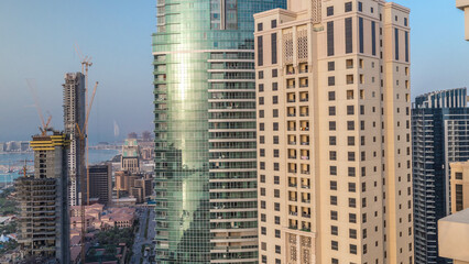 Obraz premium Modern skyscrapers in Jumeirah beach residence in Dubai, JBR aerial timelapse