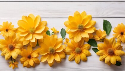 Obraz premium Bright Yellow Flowers Arranged On A White Wooden Surface