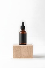 Minimalist amber glass dropper bottle with blank black label on wooden block, clean modern mockup for skincare, essential oils, cosmetics or natural beauty product branding