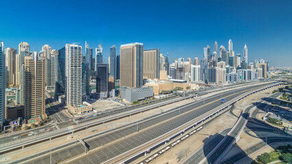Dubai Marina skyscrapers aerial top view during all day from JLT in Dubai timelapse, UAE.