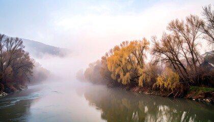 Misty river landscape with autumn trees