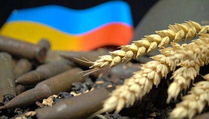Ukrainian flag and wheat amidst artillery shells