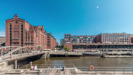 Naklejka premium Panorama showing famous old Speicherstadt in Hamburg timelapse featuring the International Maritime Museum, Germany