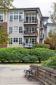 Pathway around the corner of residential building in Fort Langley, BC