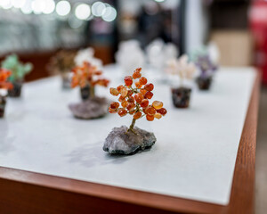 Gemstone tree with orange stones on mineral base. Crystal bonsai handmade for feng shui, chakra...