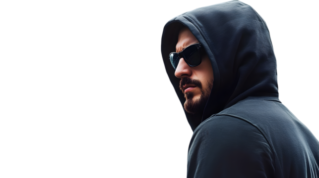 Man in hoodie and sunglasses looking over his shoulder isolated on transparent background with copy space