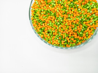 plastic masterbatch, masterbatch granules, polymer carrying pigment poured into a glass cup forming a circle with a white background, as a product catalog design for a plastic industry company profile