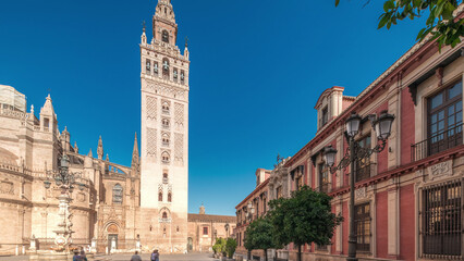 Fototapeta premium Seville Cathedral and Giralda Tower timelapse hyperlapse panorama, Spain