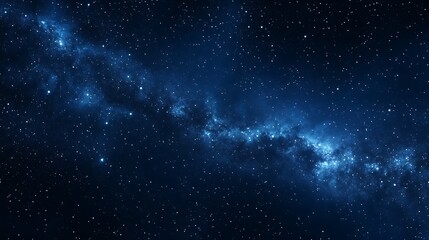 Fototapeta premium Vast cosmic panorama of the milky way galaxy with glowing stars and nebulae illuminating the deep blue night sky