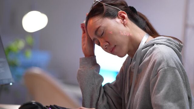 An employee experiences burnout from excessive overtime and a high-stress corpo Lines of code from the screen.