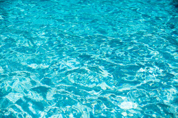 Fototapeta premium Blue ripped water in swimming pool, water pool texture and surface water backgraund.