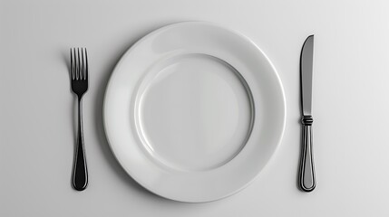 Minimalist white plate setting with fork and knife on white surface