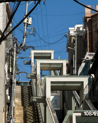Outdoor escalator on hillside street in Yongsan, Seoul