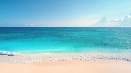 Calm turquoise ocean waves gently lapping onto soft sandy beach under clear bright sky with fluffy white clouds