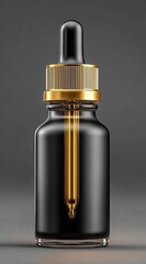 Dark glass dropper bottle with gold cap