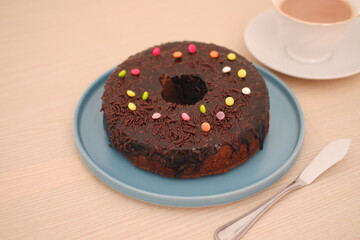 Chocolate Cake with Sprinkles and Tea