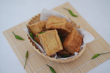 Crispy Fried Tofu in a Basket with Chili Peppers