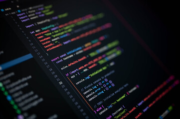 Close-up of colorful programming code on screen showing Vue configuration with axios.defaults and console debugging, symbolizing frontend development, software engineering, and digital technology.