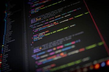 Close-up of colorful programming code on screen showing editUser function with async payload and statusCode, symbolizing software development, user management, API coding, and digital technology.