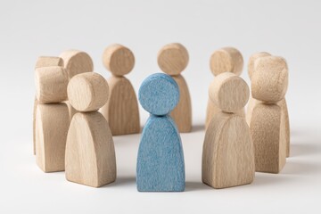Wooden figures, a single blue one in a circle