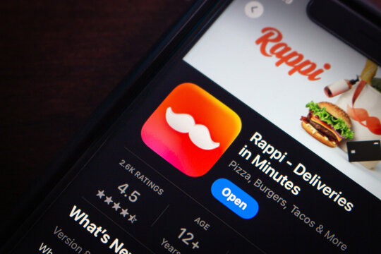 Mexico City, MEXICO - Aug 21 2025 : Mobile screen displaying Rappi app store listing with rating, delivery tagline, and food items like burgers and tacos.