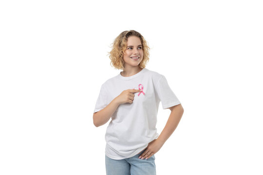 Woman smiles, points to pink ribbon, isolated on white, PNG