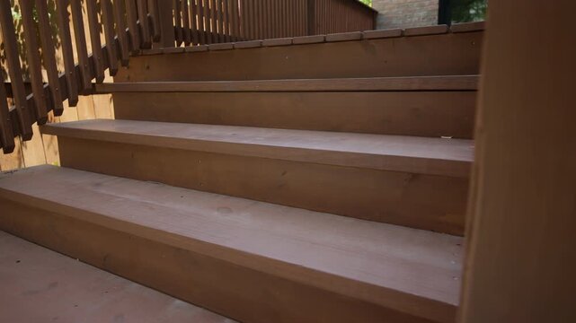 Element of the exterior, wooden deck stairs after the repair, slow move wide camera shot