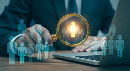 Professional magnifying glass highlights key team member amidst diverse workforce for recruitment success