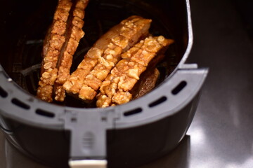Crispy fried pork on white plate, Delicious glazed pork belly with crispy skin, Crispy Pork