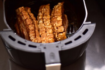 Crispy fried pork on white plate, Delicious glazed pork belly with crispy skin, Crispy Pork