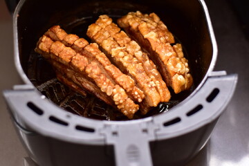 Crispy fried pork on white plate, Delicious glazed pork belly with crispy skin, Crispy Pork