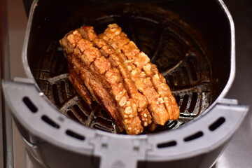 Crispy fried pork on white plate, Delicious glazed pork belly with crispy skin, Crispy Pork
