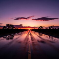 Obraz premium Endless horizon road reflecting a twilight sky after heavy rainfall