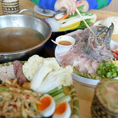 young woman eating thai food in restaurants