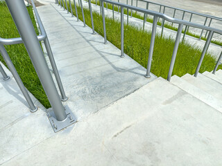 ramp with handrails for disabled persons in wheelchairs. barrier-free urban environment.