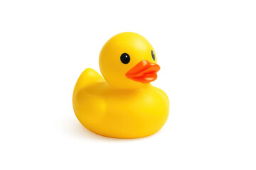 Vibrant yellow rubber duck with water droplets and soft shadow isolated on glossy white surface playful minimalist product cutout