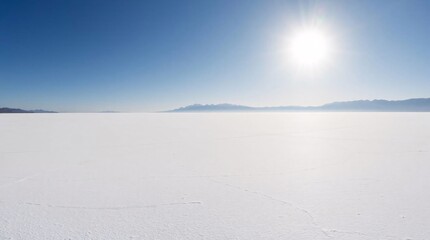 Salt Lake landscape with sun and blue sky.