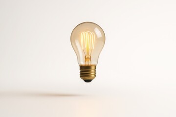 Vintage Edison filament light bulb floating on pure white with soft shadow and crisp reflections a minimal studio product shot for bright ideas
