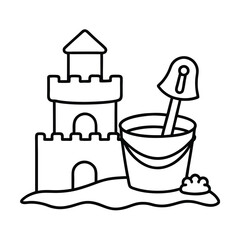 sandcastle with bucket and shovel beach play scene 