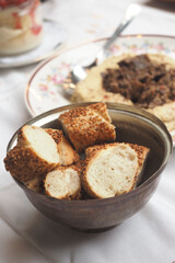 Freshly baked bread served with delicious hummus dip