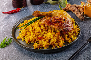 Roasted chicken leg with yellow rice