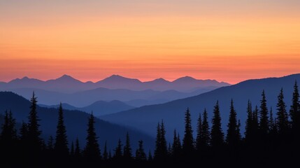 Obraz premium silhouette of distant mountain range outlined by fiery sky, conifer forest shadowed in cool twilight