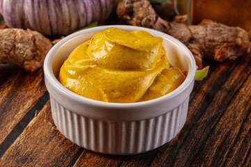Indian yellow spicy curry sauce