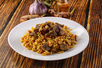 Asian traditional pilaf with beef