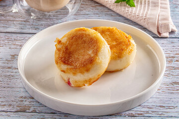 Fried homemade cottage cheese syrniki