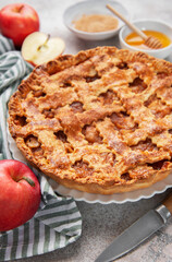Freshly baked apple pie with honey and brown sugar