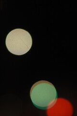 Vibrant traffic bokeh with red and yellow lights, soft night focus. Abstract city street with glowing headlights, bokeh motion blur.